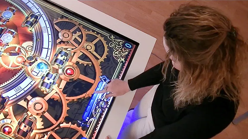 A beautiful shot of a beautiful lady playing a beautifully animated game.