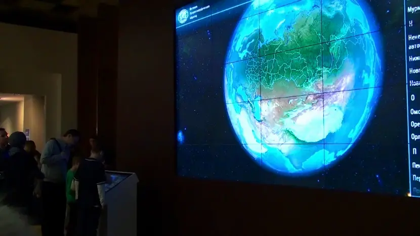 Video wall with animated 3D model of the globe.
