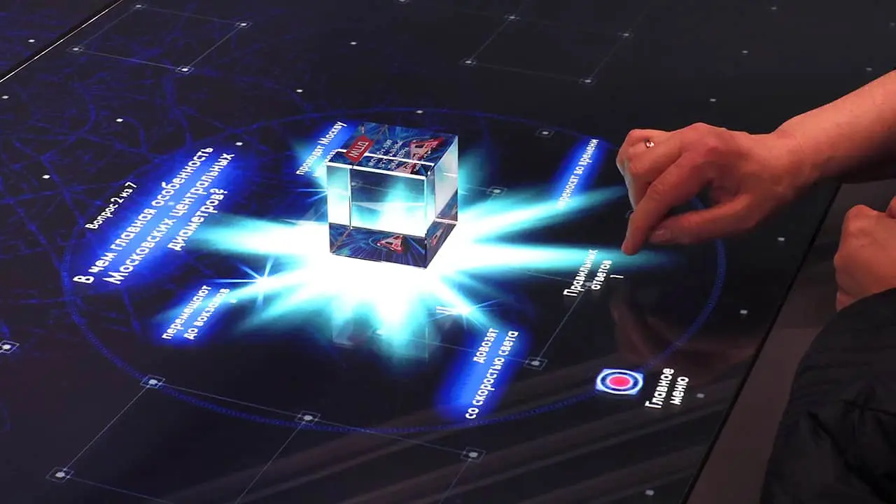 Customized crystal navigation cube with MCD symbols.